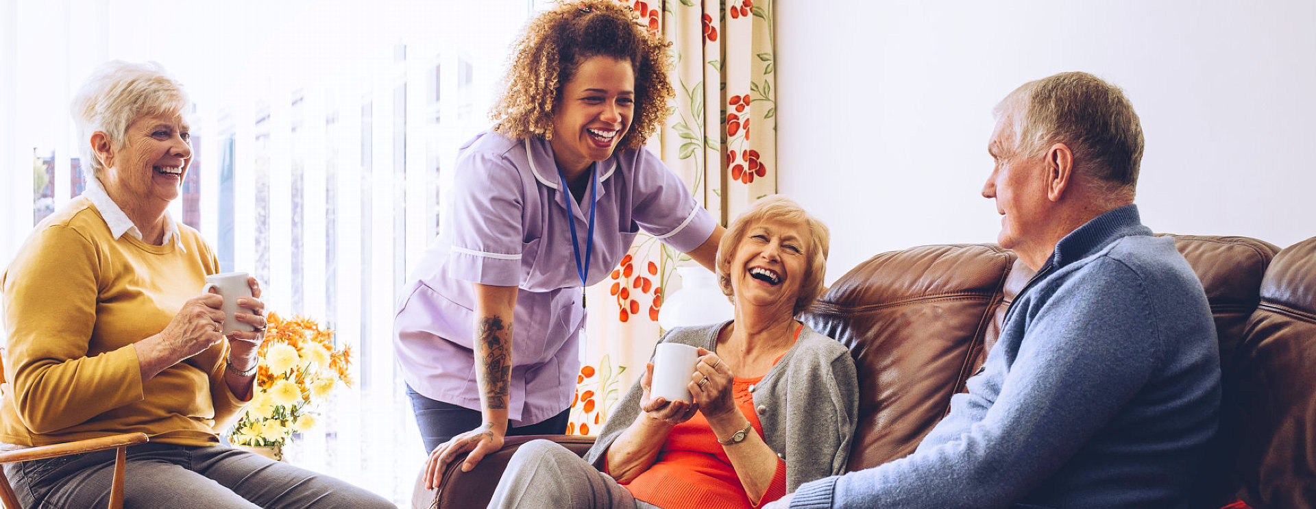 caregiver talking to seniors