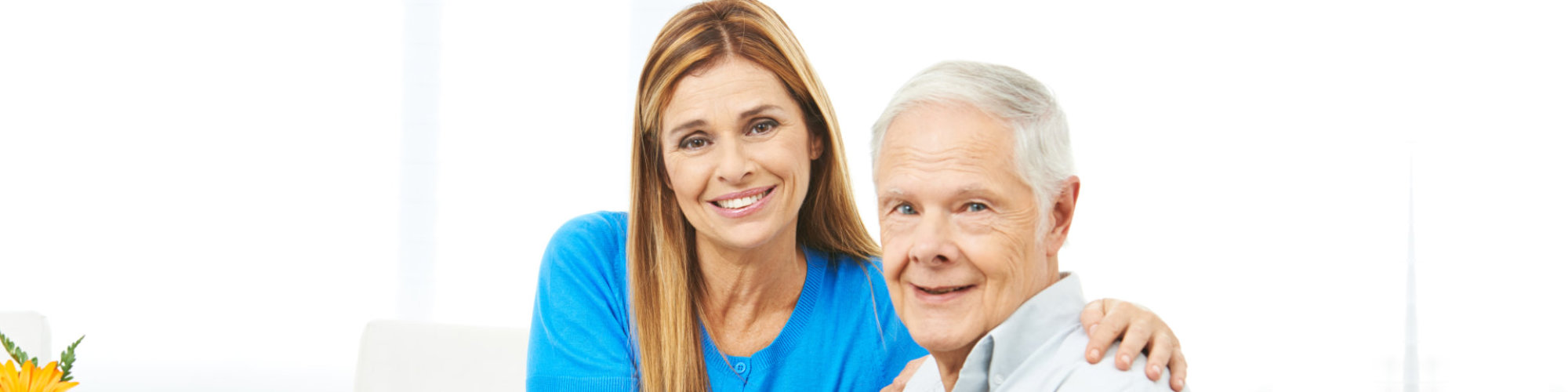 woman and senior man smiling